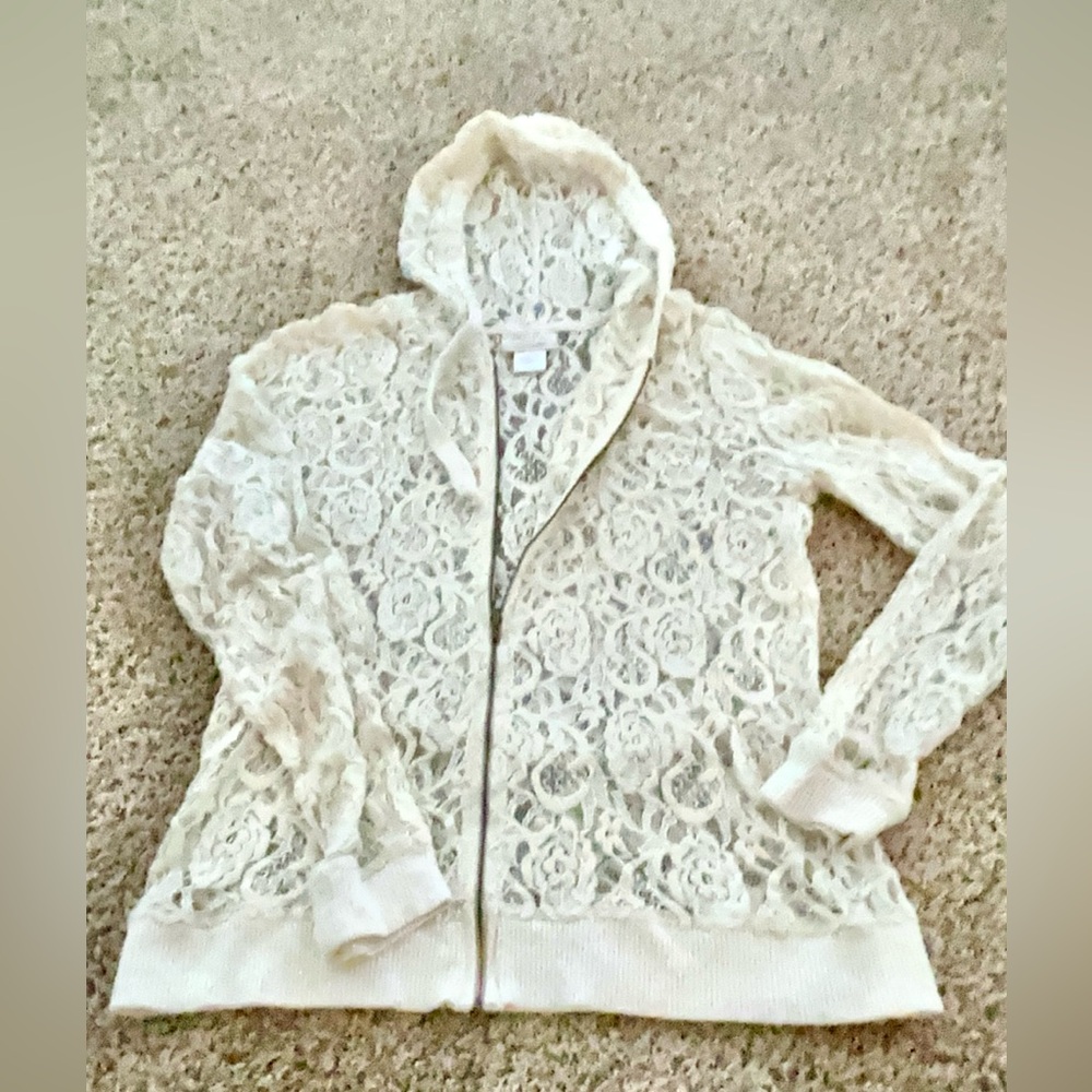 Nice crème colored lace, zip up hoodie size medium.